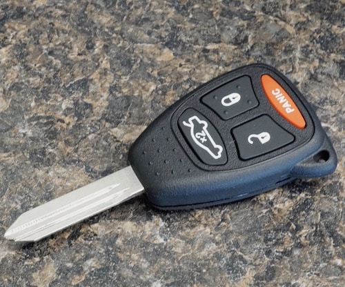 remote head car key on a table